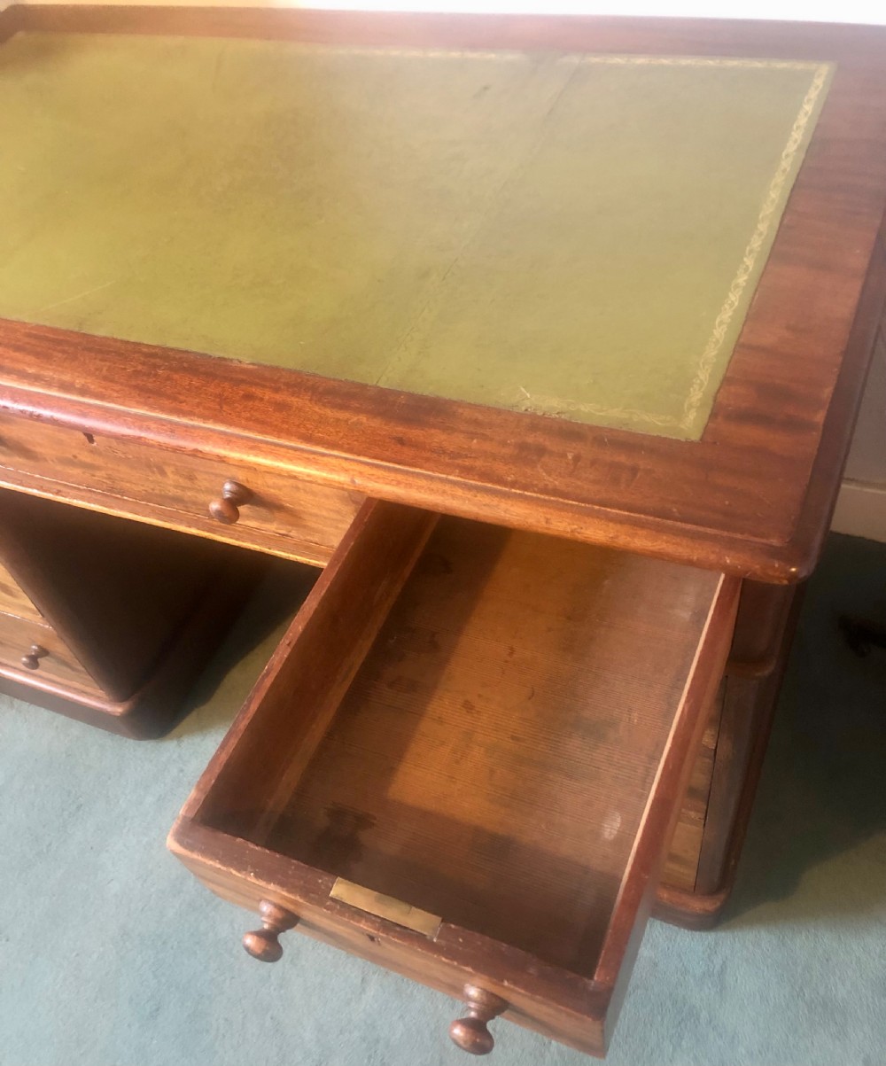 Victorian mahogany pedestal desk with green leather top View VII