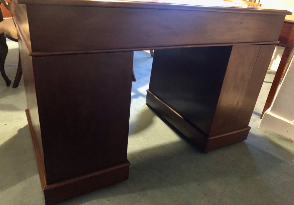 Victorian mahogany pedestal desk with green leather top View VIII