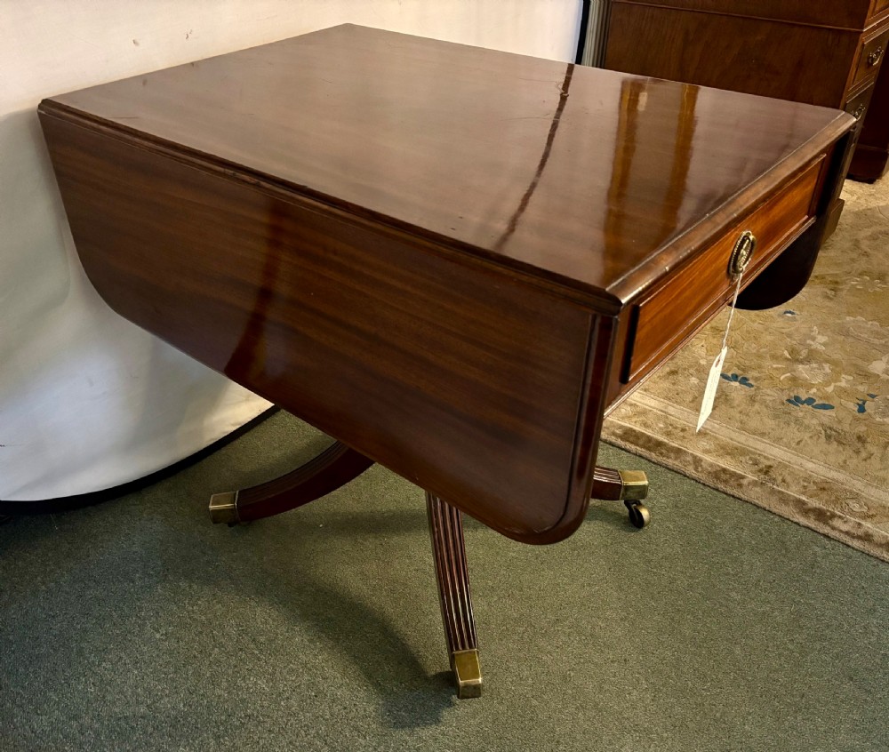 Small Regency figured mahogany supper table View II