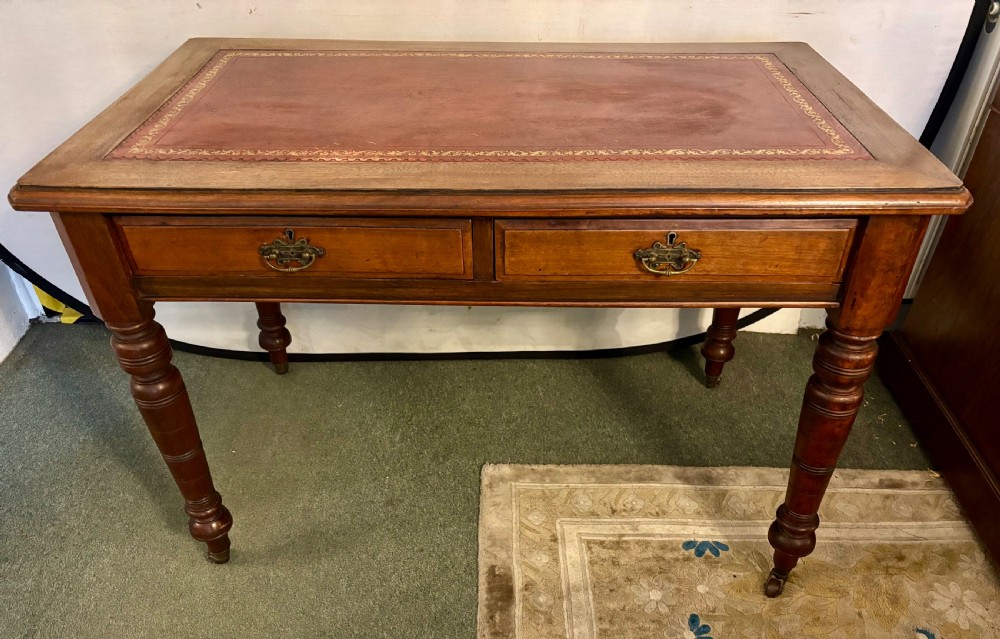 VictorIan mahogany writing table with burgundy leather top View III