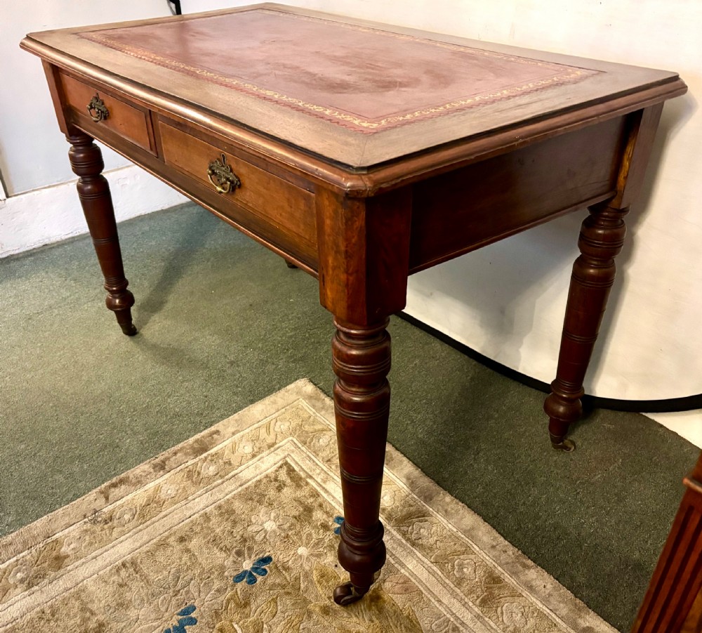 VictorIan mahogany writing table with burgundy leather top View IV