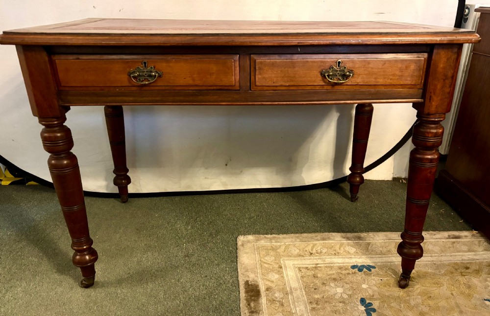 VictorIan mahogany writing table with burgundy leather top View V
