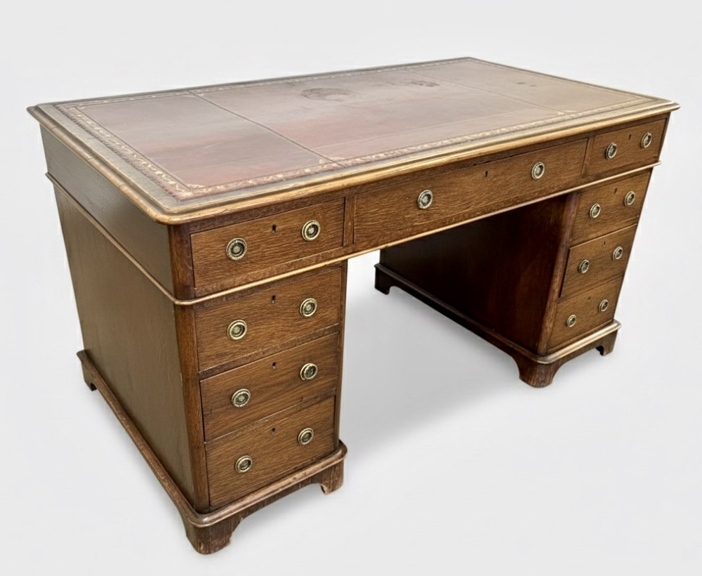 Victorian oak pedestal desk with leather gilt tooled top