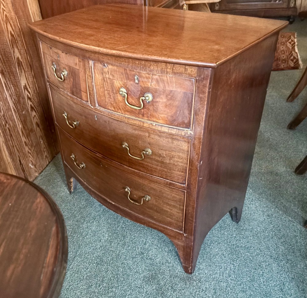 Small 19th century mahogany bow front chest of drawers View IV
