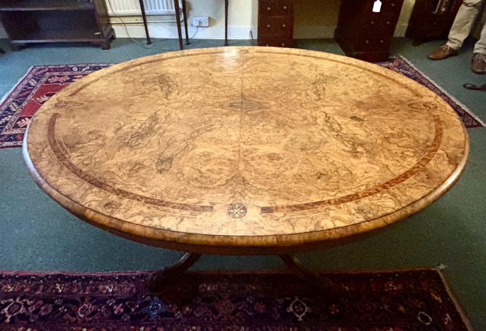 Fine Victorian figured walnut and inlaid oval breakfast table View IV