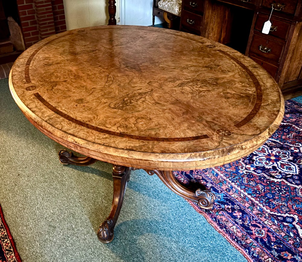 Fine Victorian figured walnut and inlaid oval breakfast table View X