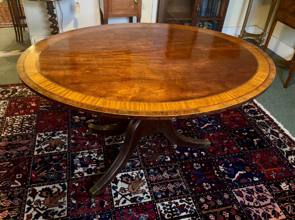 Regency mahogany and crossbanded oval breakfast table View III