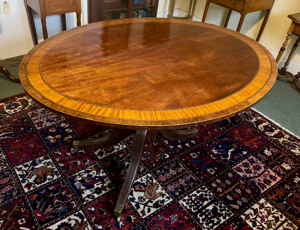 Regency mahogany and crossbanded oval breakfast table View IV