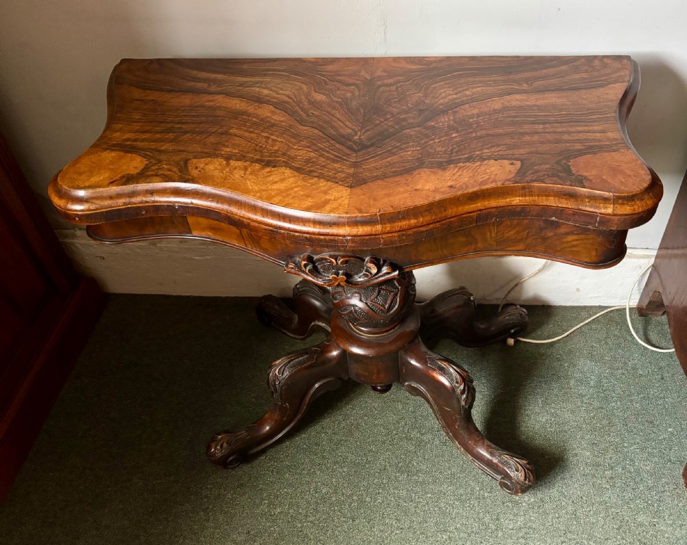 Victorian walnut serpentine card table