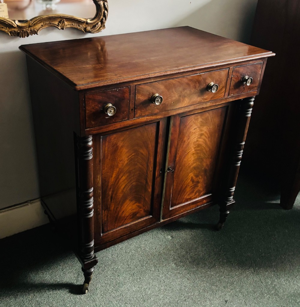 Small Regency figured mahogany side cabinet View IV