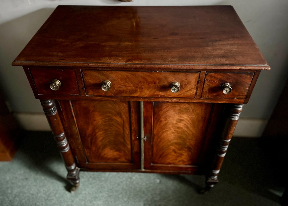 Small Regency figured mahogany side cabinet View V