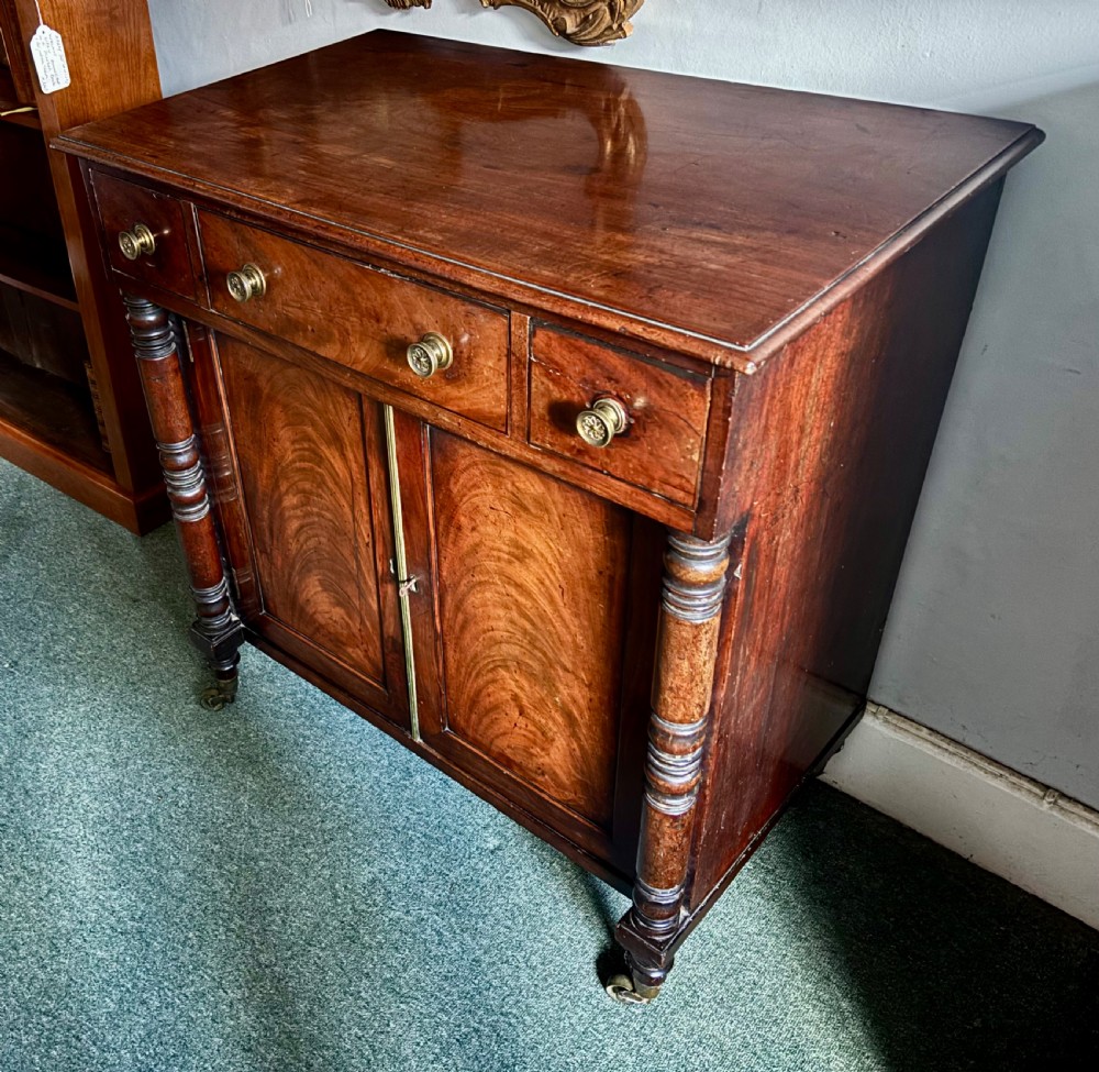 Small Regency figured mahogany side cabinet View IX