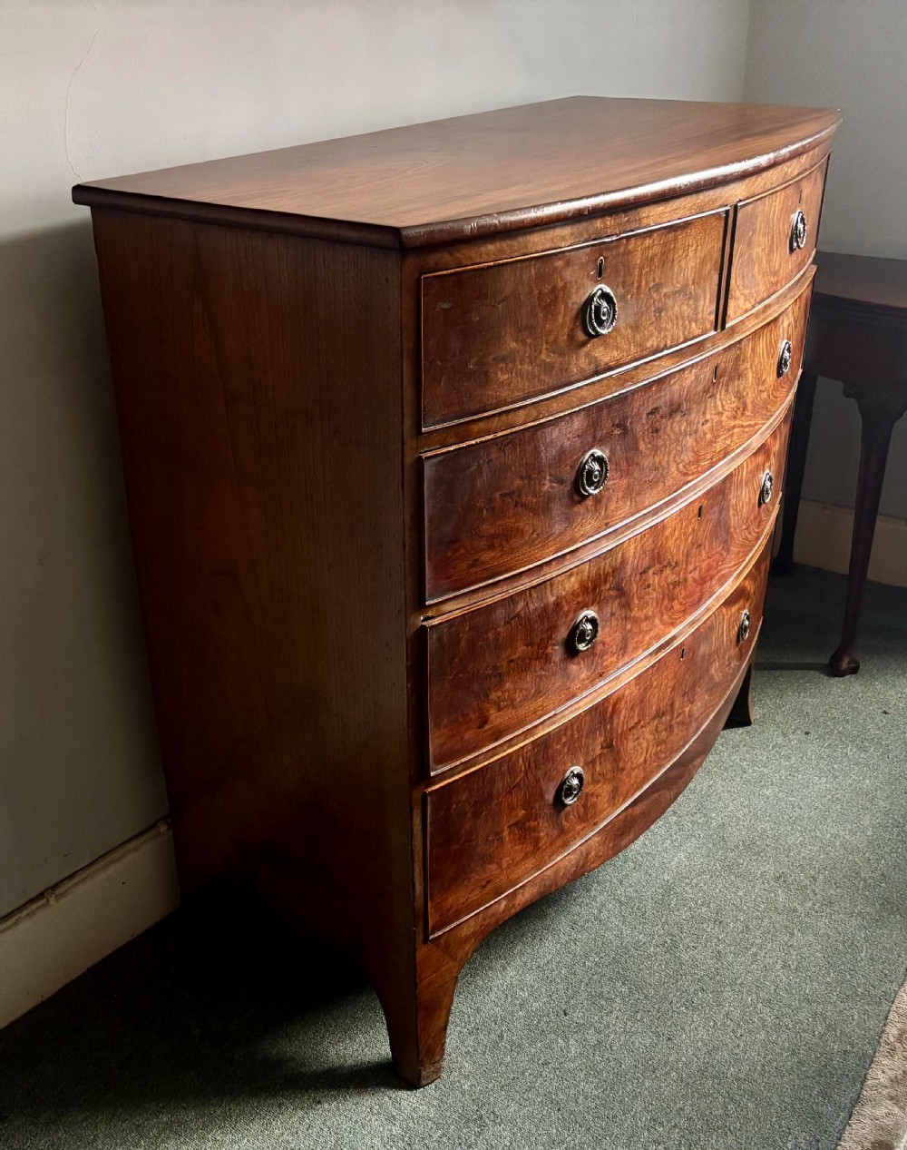 Regency figured mahogany bow front chest of drawers View II