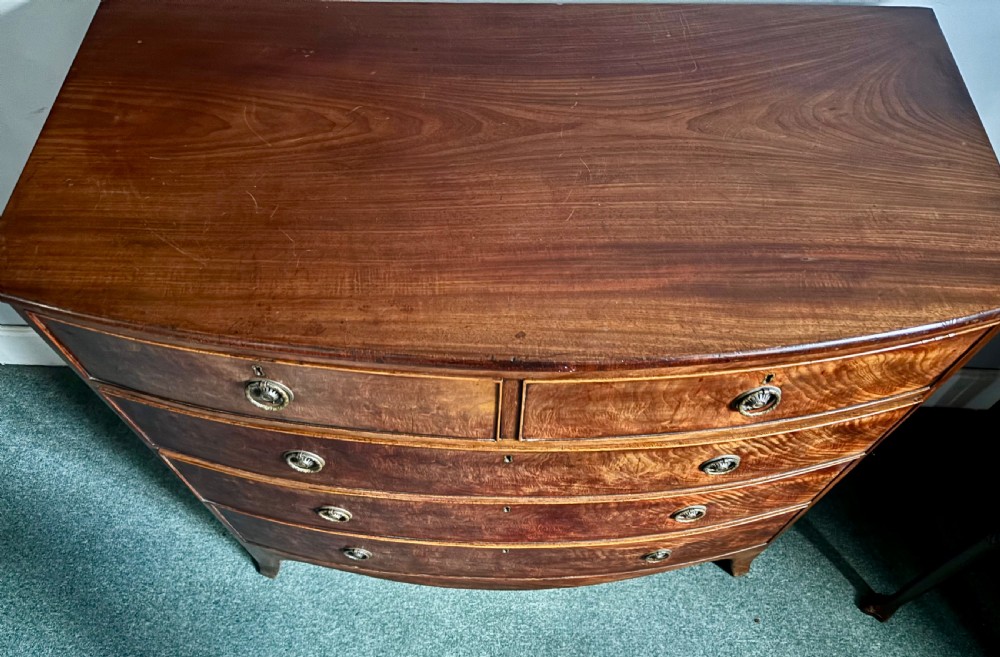 Regency figured mahogany bow front chest of drawers View III