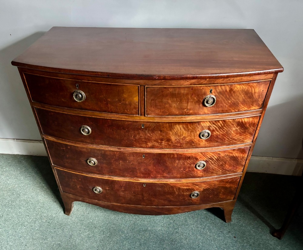 Regency figured mahogany bow front chest of drawers View V