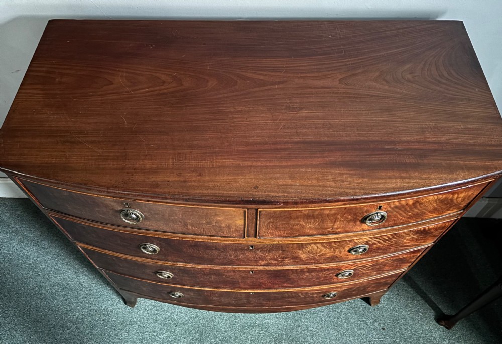 Regency figured mahogany bow front chest of drawers View VI
