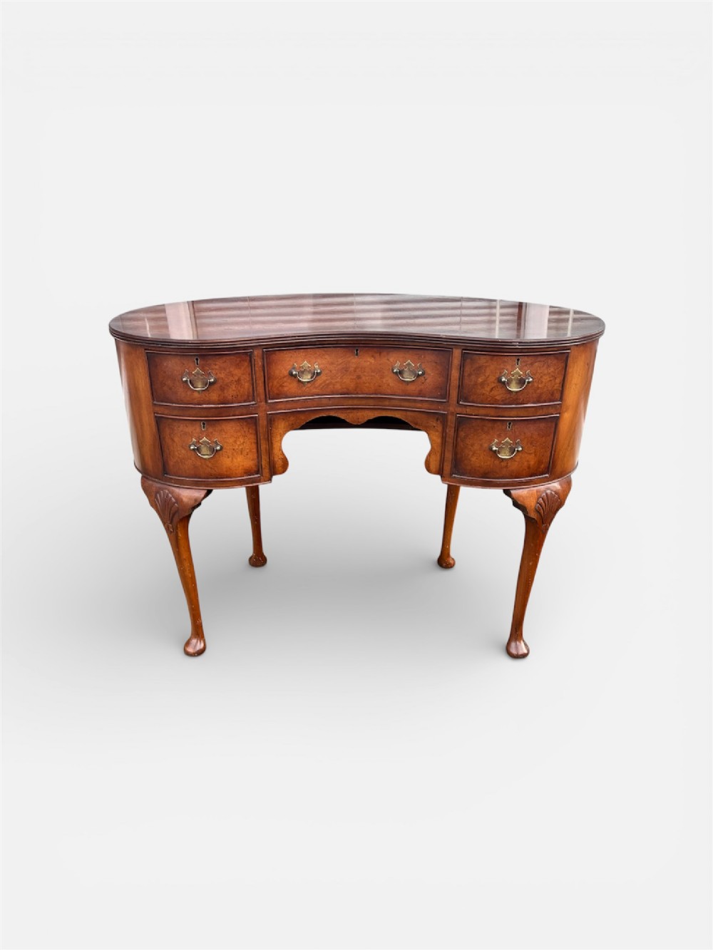 Burr walnut kidney shaped dressing table