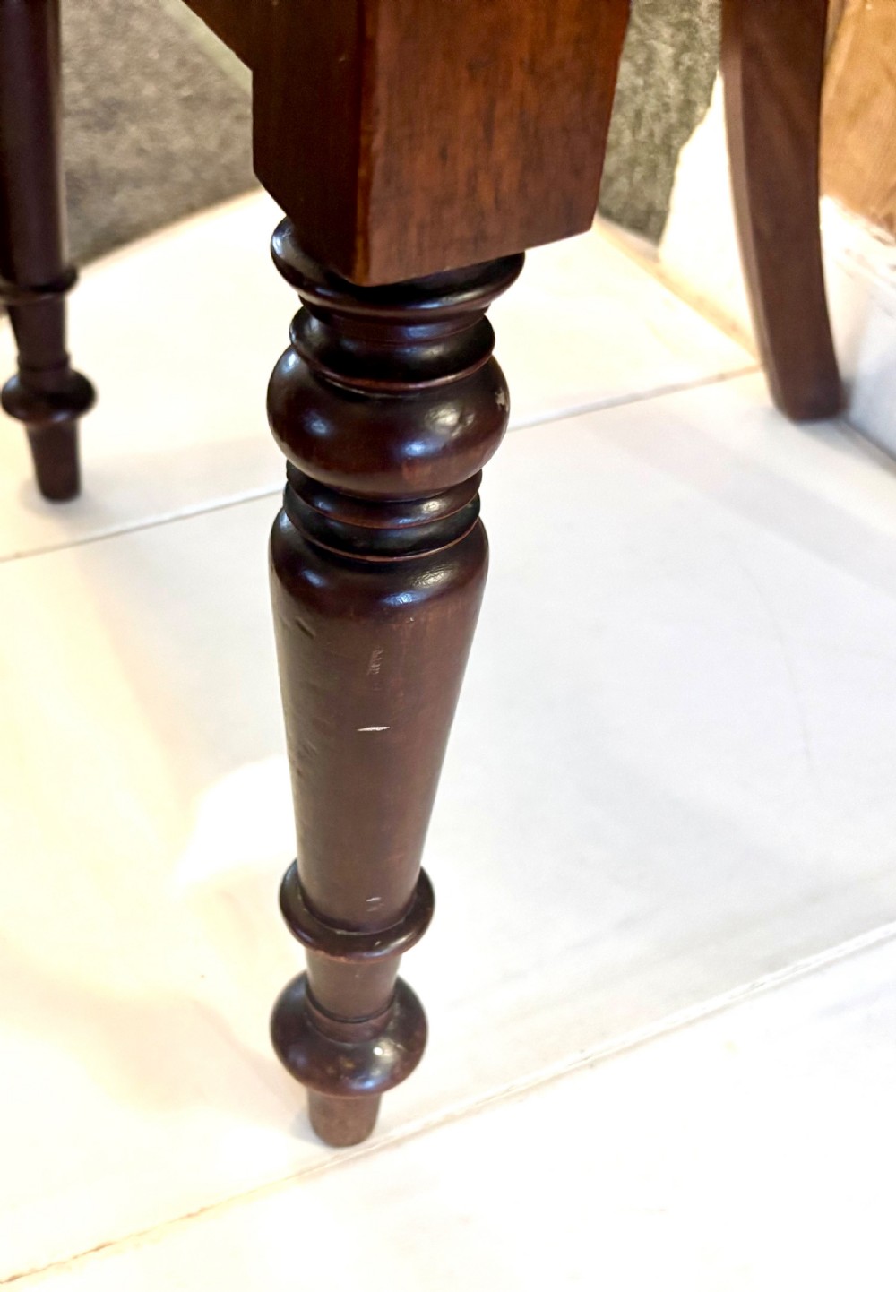 A set of six early Victorian balloon back dining chairs made of dark mahogany wood with mustard yellow textured seats. View VIII