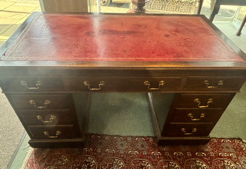Large Edwardian mahogany pedestal desk with burgundy leather top View II