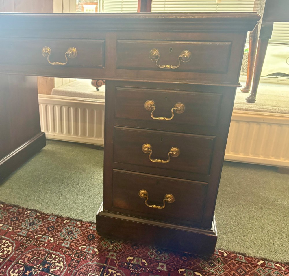 Large Edwardian mahogany pedestal desk with burgundy leather top View V