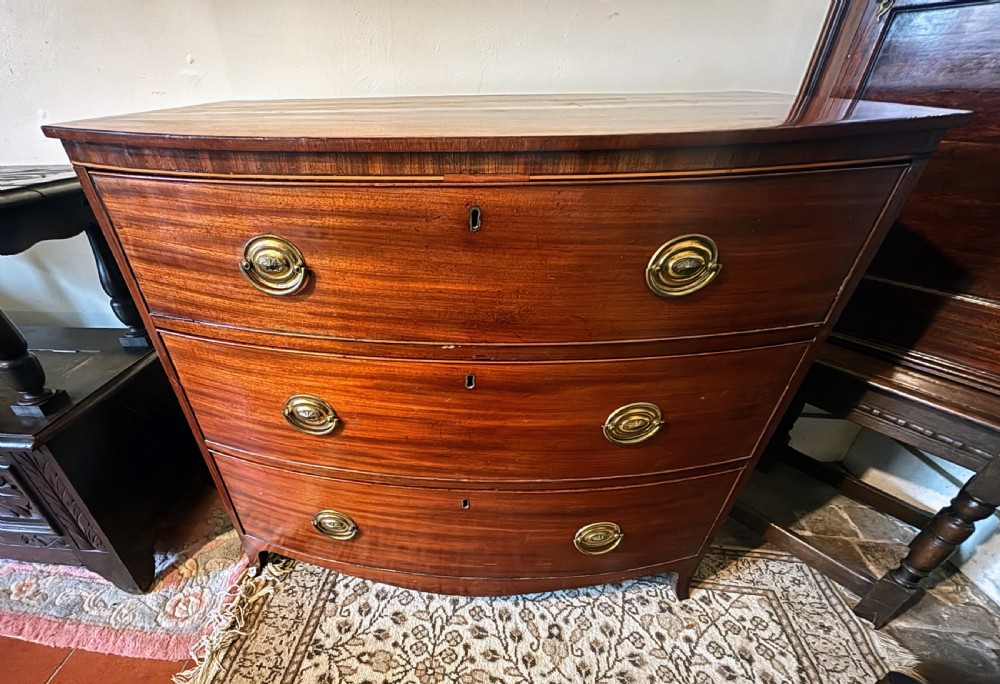 Regency mahogany small bow front chest of drawers View VI