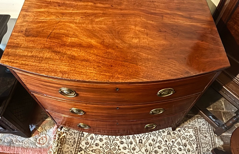 Regency mahogany small bow front chest of drawers View VII