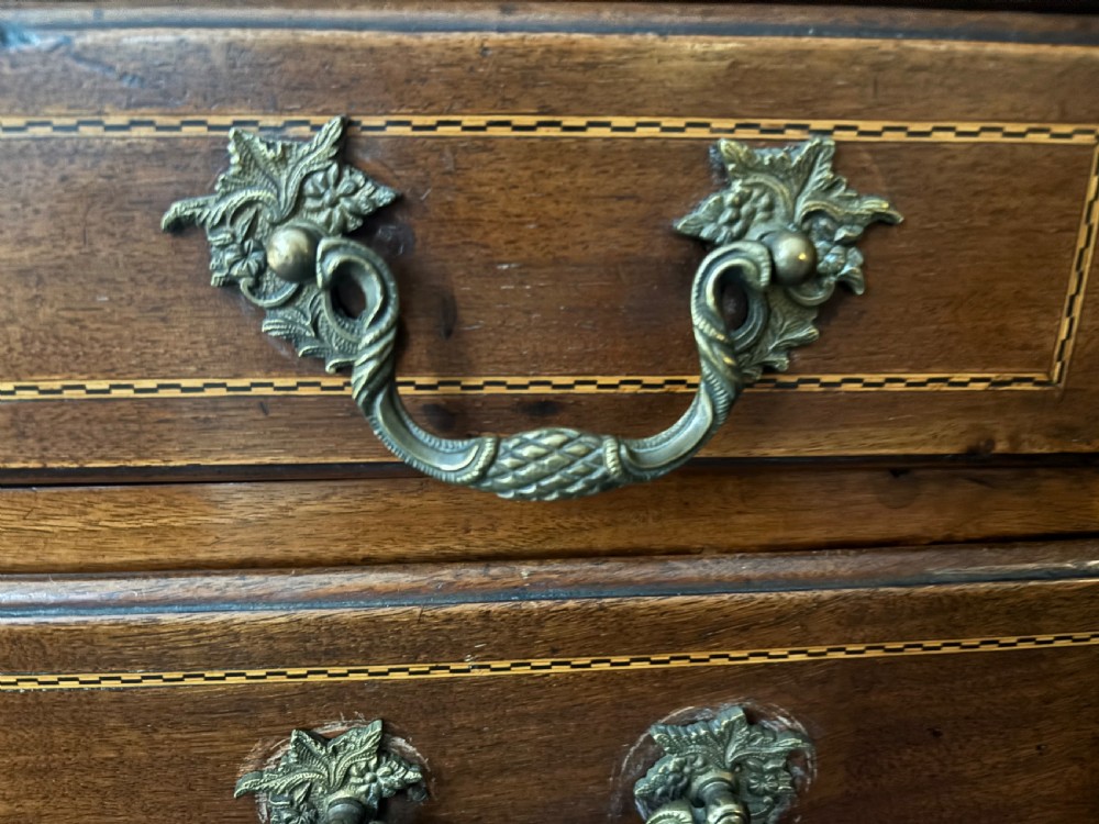 An 18th-century George III mahogany slant-front bureau featuring satinwood shell inlays and four graduating drawers with brass handles. View VIII