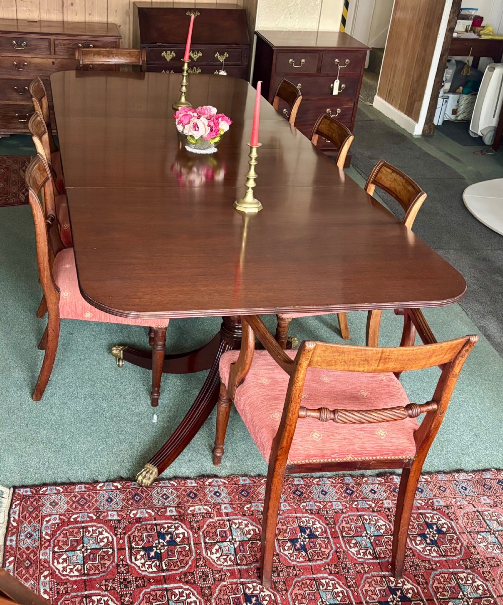 Fine quality large Regency design mahogany twin pillar dining table View IV