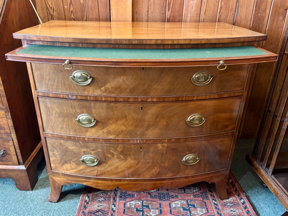 Fine Regency figured mahogany bow front chest of drawers View II
