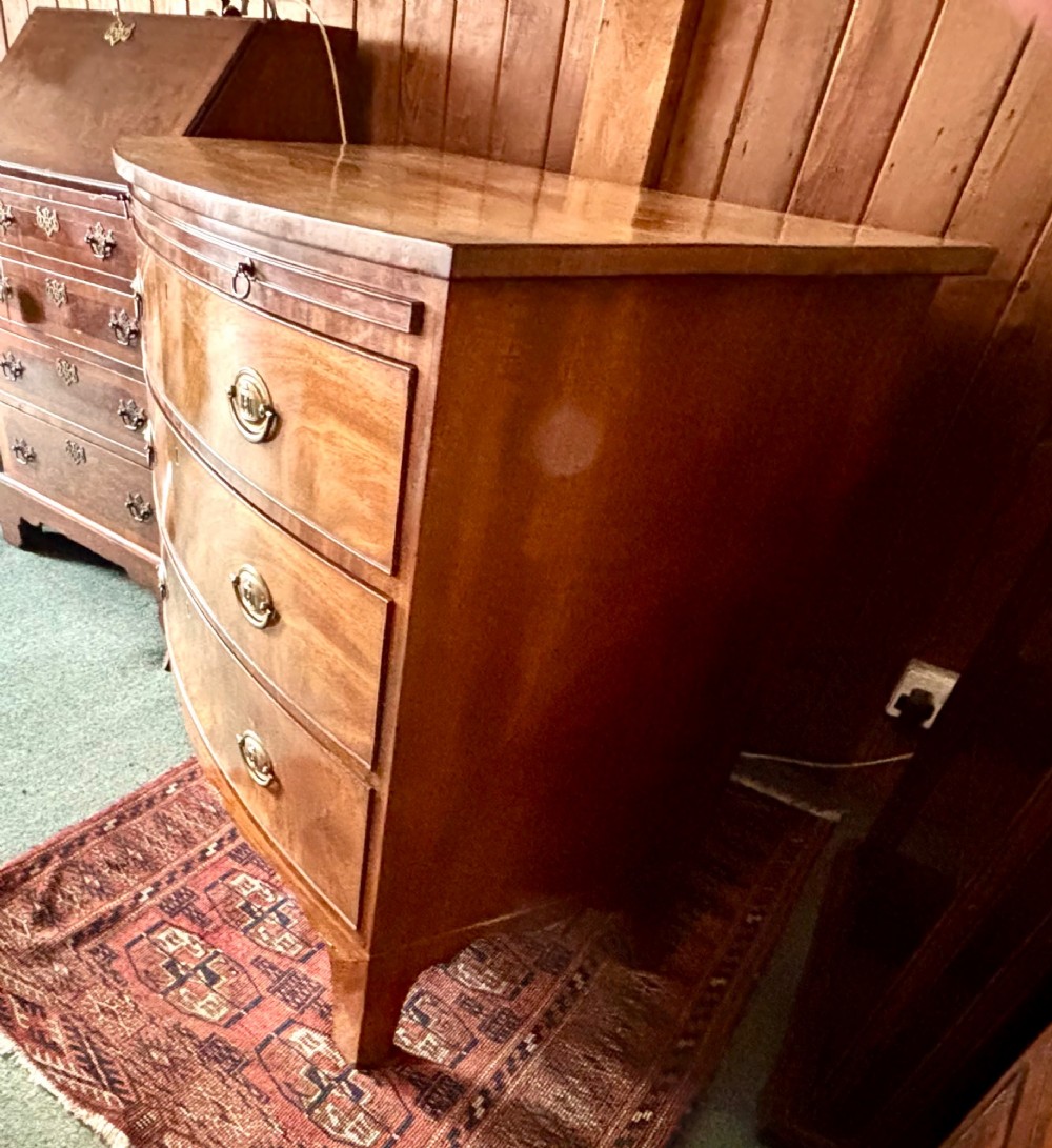 Fine Regency figured mahogany bow front chest of drawers View IV