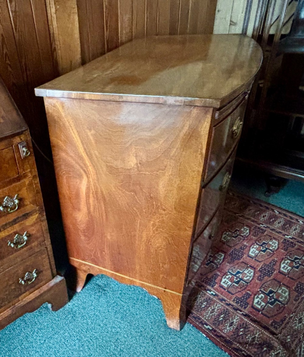 Fine Regency figured mahogany bow front chest of drawers View V