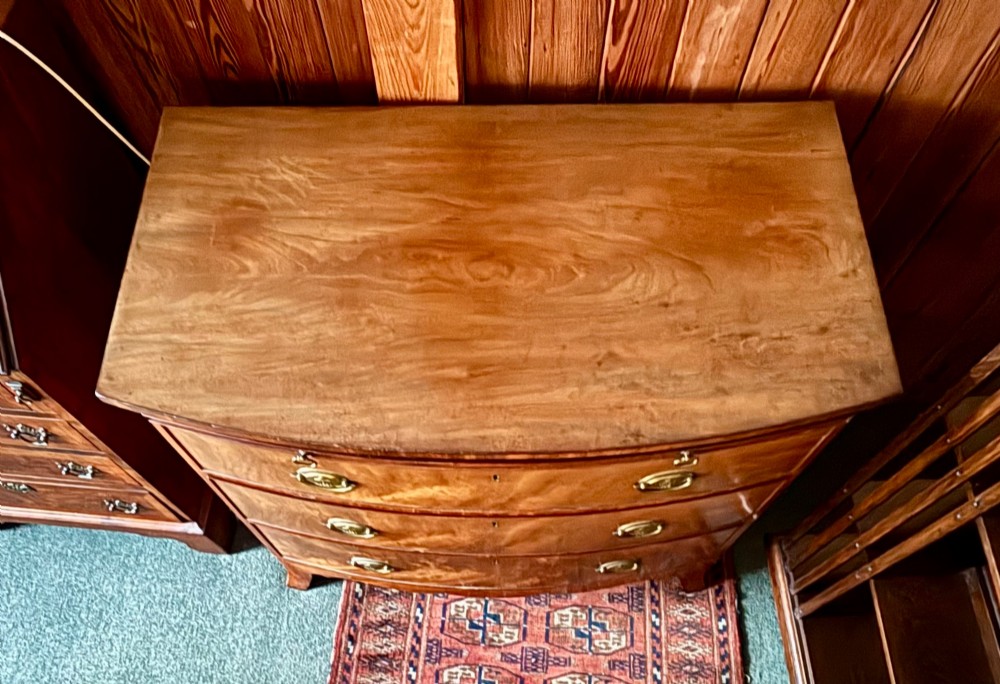Fine Regency figured mahogany bow front chest of drawers View VI