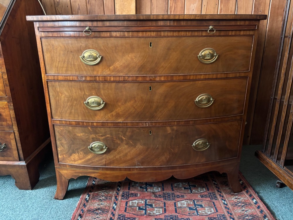 Fine Regency figured mahogany bow front chest of drawers View X