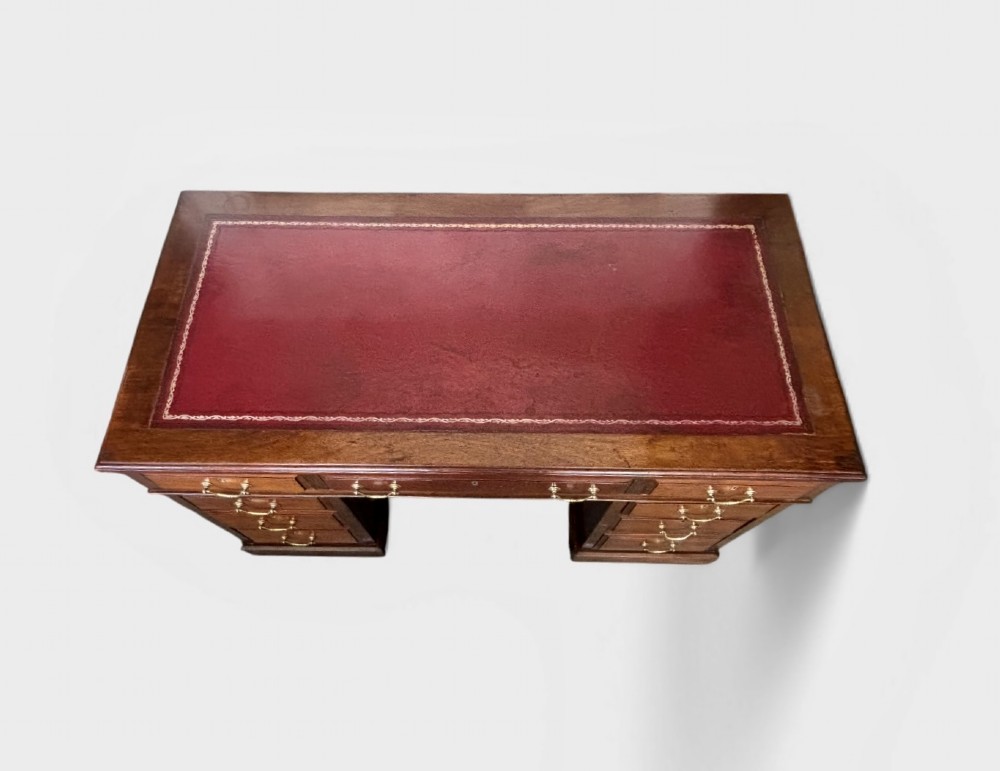 Victorian mahogany pedestal desk with burgundy leather top View II