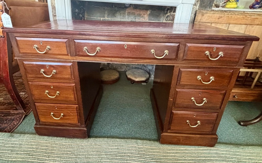 Victorian mahogany pedestal desk with burgundy leather top View IV