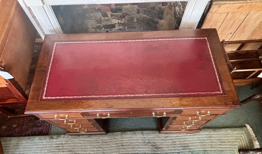 Victorian mahogany pedestal desk with burgundy leather top View VI