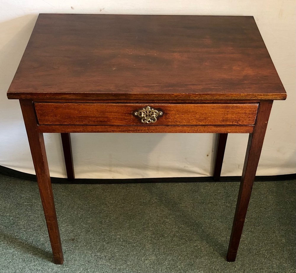 A small George III mahogany side table featuring a single frieze drawer, brass backplate handle, and four straight legs. View III