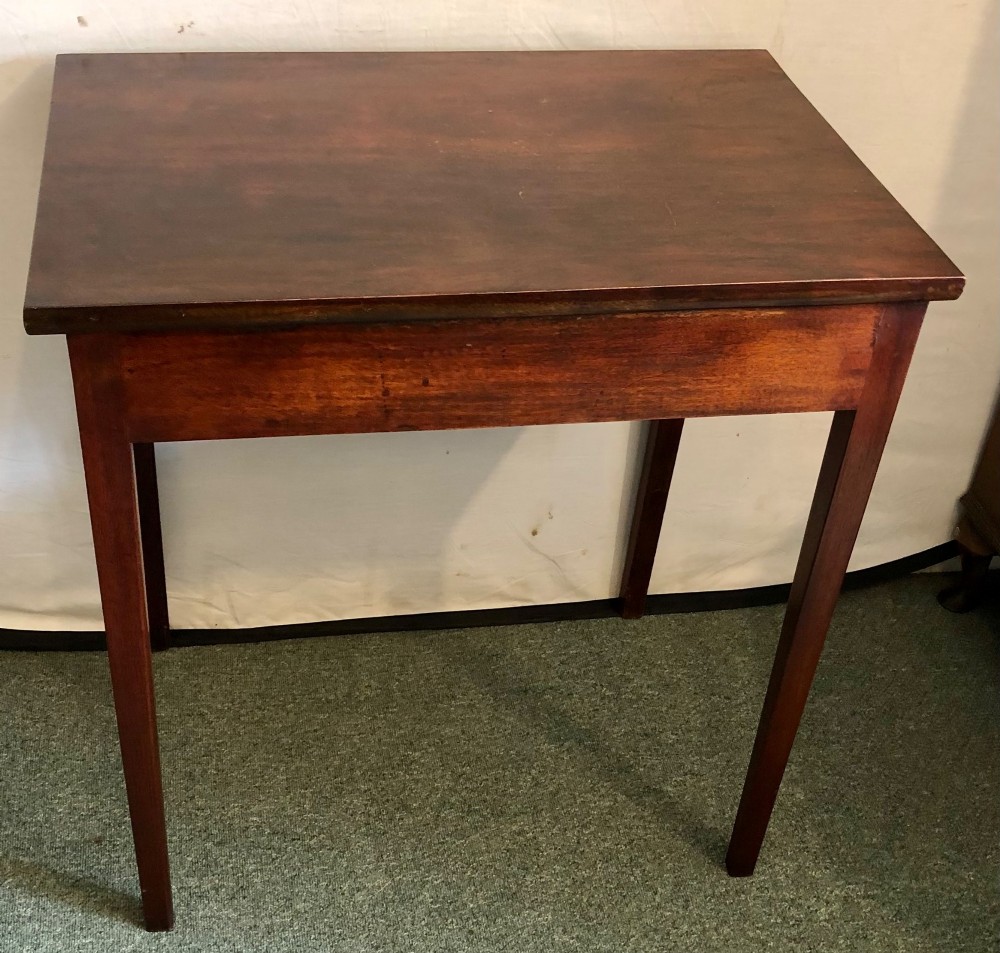 A small George III mahogany side table featuring a single frieze drawer, brass backplate handle, and four straight legs. View VIII