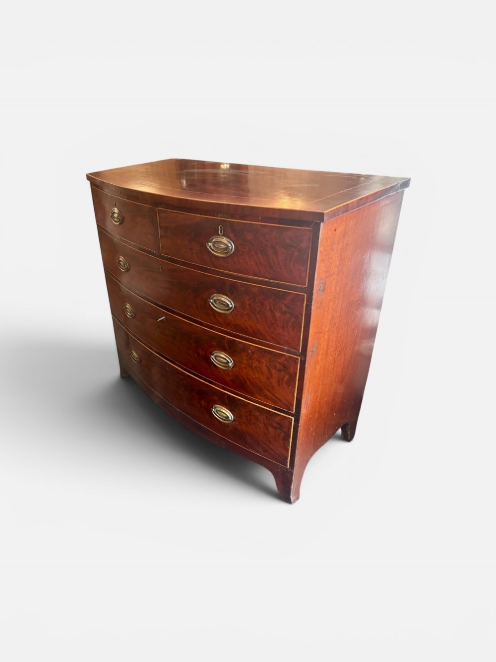 Regency mahogany and cross-banded bow front chest of drawers
