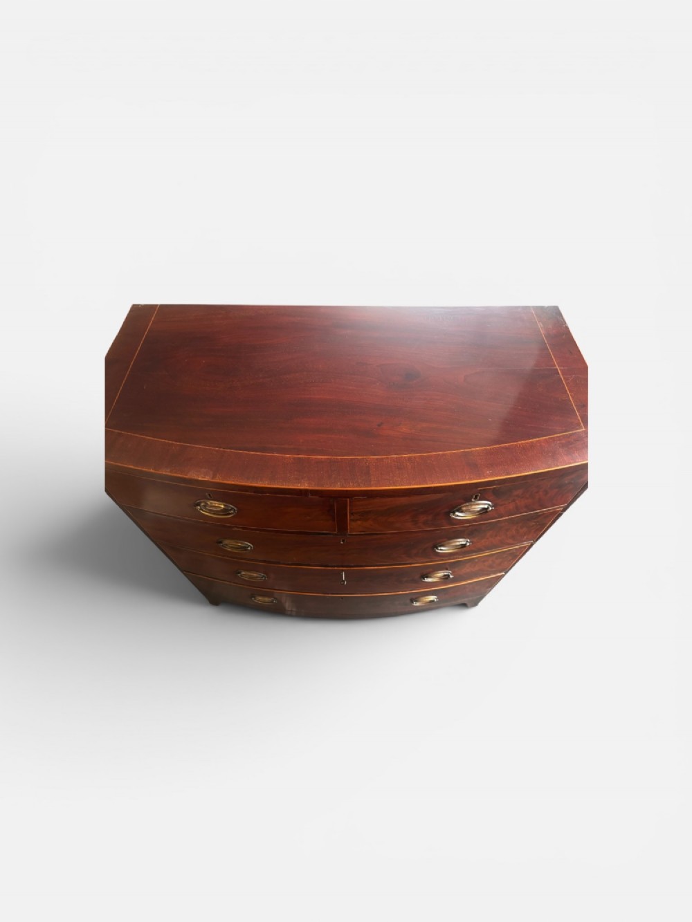 Regency mahogany and cross-banded bow front chest of drawers View II