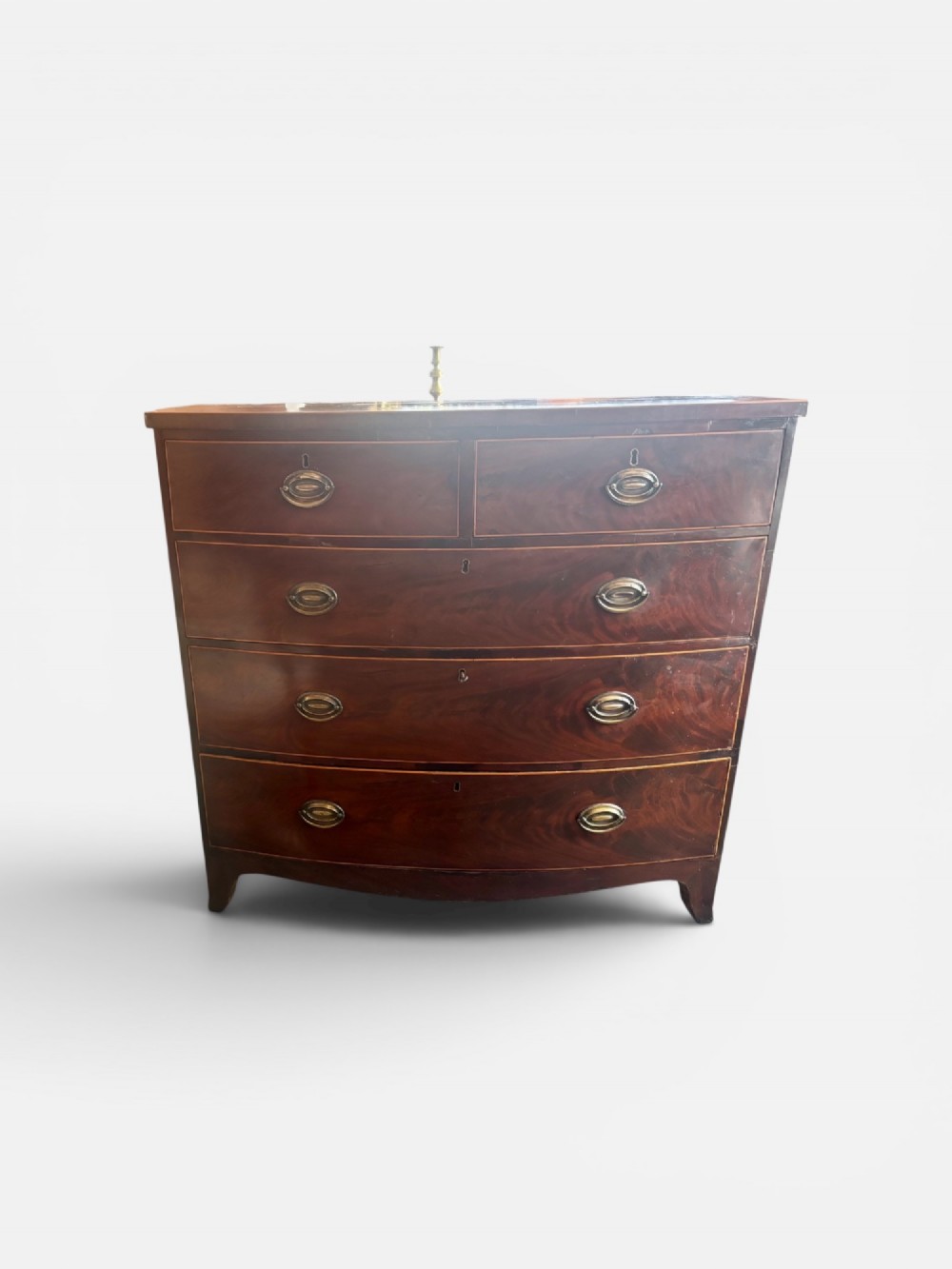Regency mahogany and cross-banded bow front chest of drawers View VII