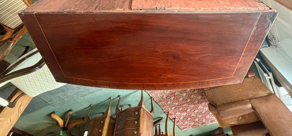 Regency mahogany and cross-banded bow front chest of drawers View VIII
