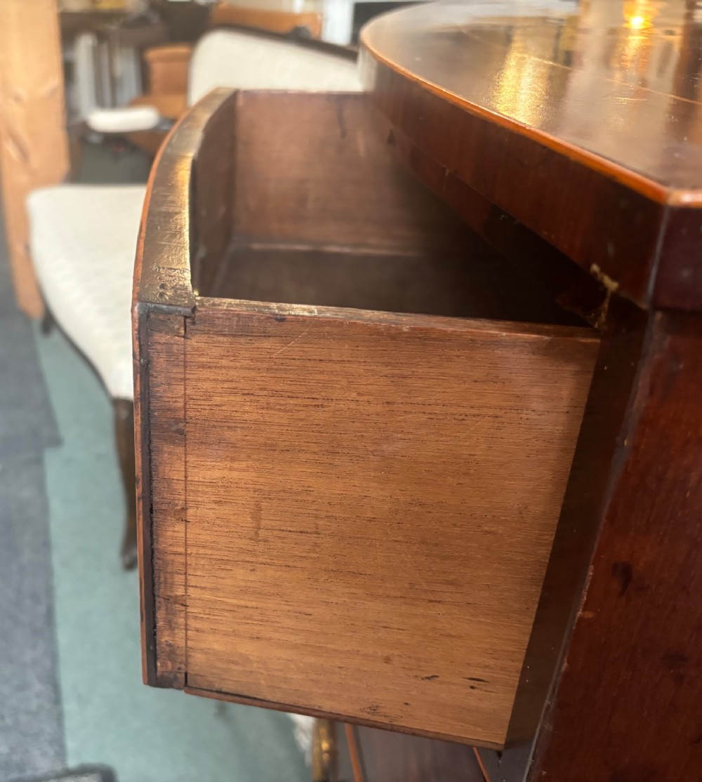 Regency mahogany and cross-banded bow front chest of drawers View X