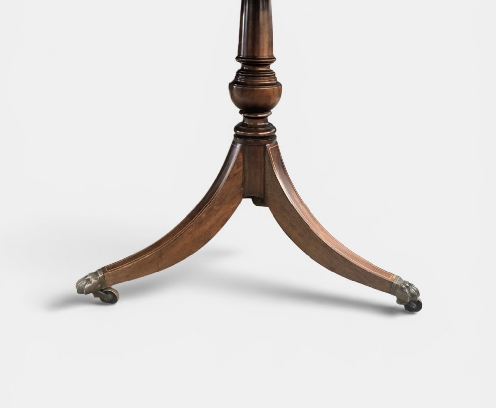 Regency design figured mahogany twin pillar dining table View II