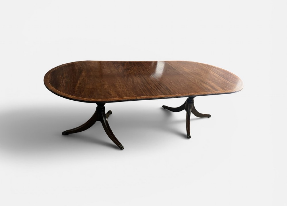 Regency design figured mahogany twin pillar dining table View III