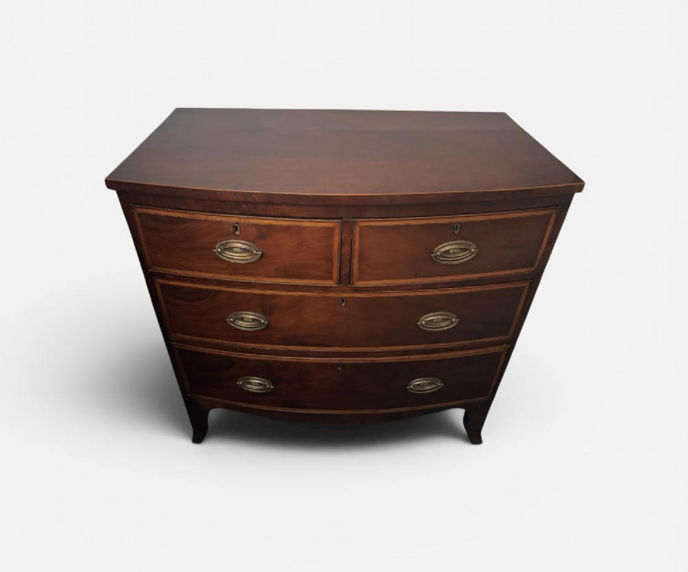 Regency mahogany small bow front chest of drawers View II