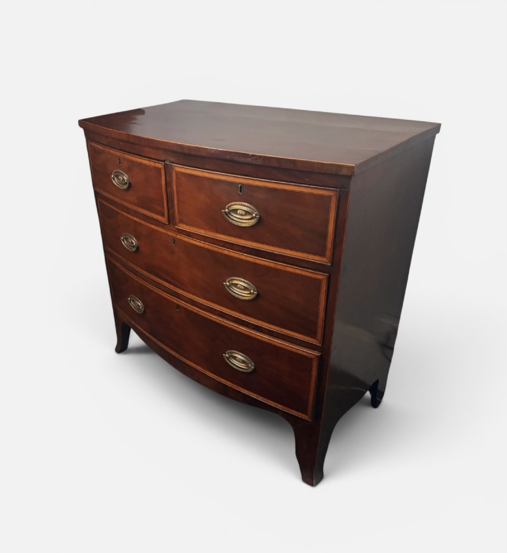 Regency mahogany small bow front chest of drawers View III