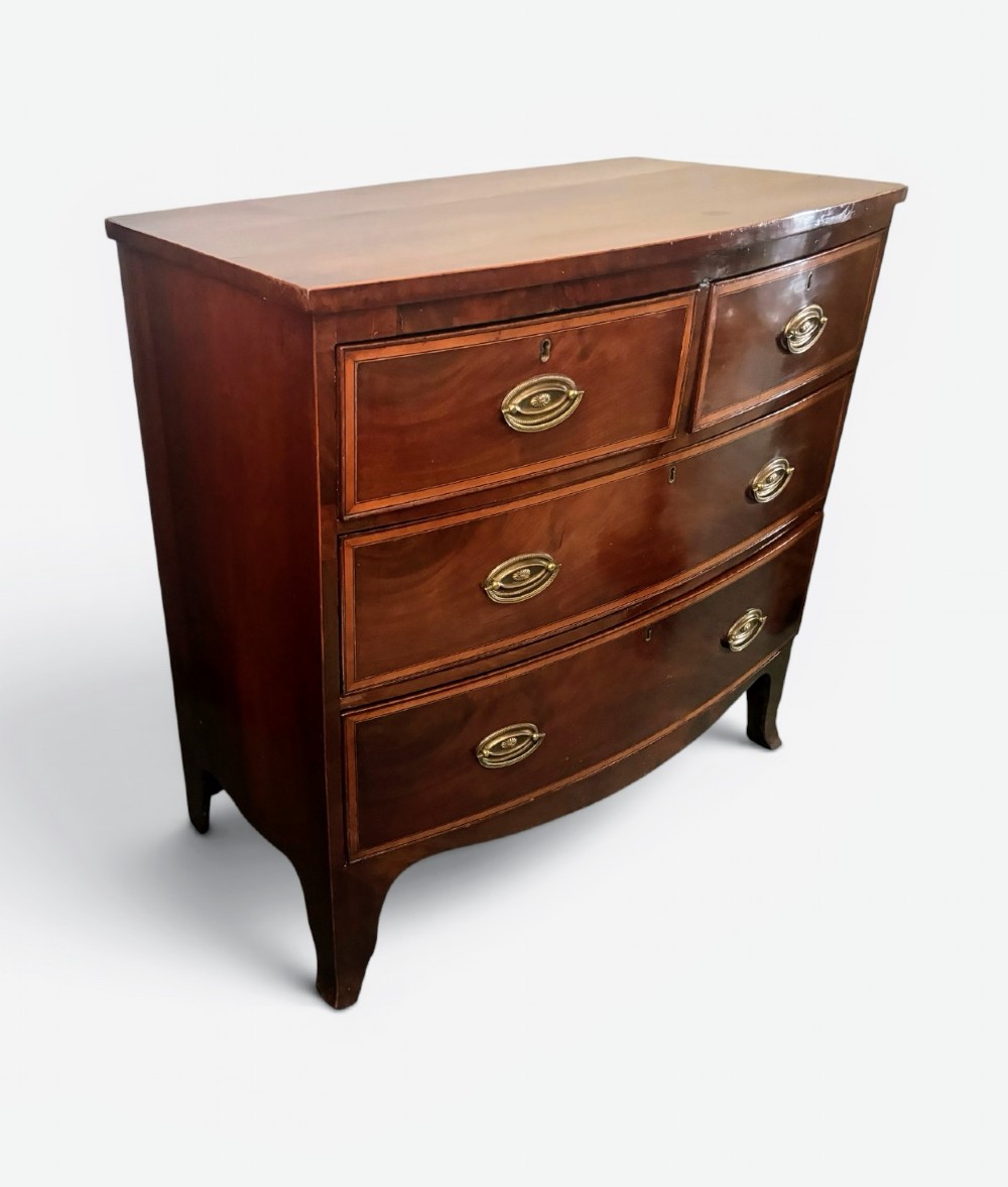 Regency mahogany small bow front chest of drawers View IV