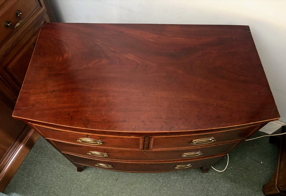 Regency mahogany small bow front chest of drawers View V