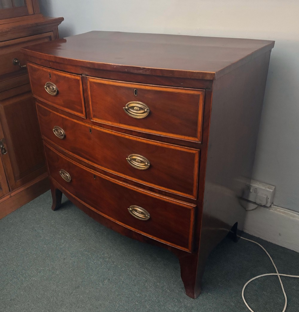 Regency mahogany small bow front chest of drawers View VII